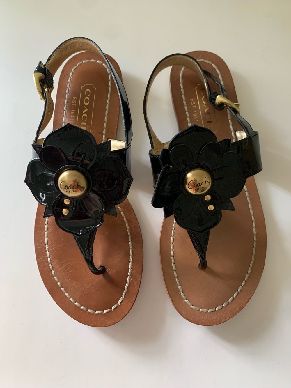 Coach Sari Patent Leather Flower Ankle Strap Buckle Thong Sandals, Black, 6B